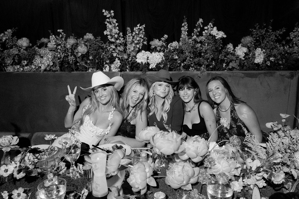 Image may contain Lauren Alaina Miranda Lambert Flower Flower Arrangement Flower Bouquet Plant Clothing Hat and Rose