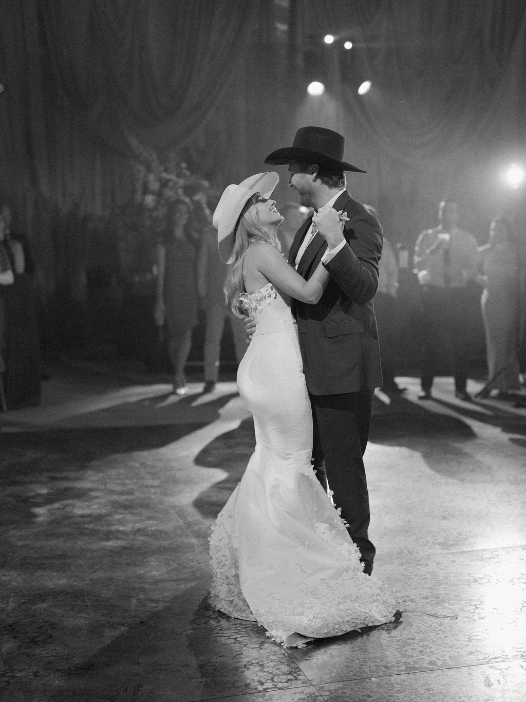 Image may contain Clothing Dress Formal Wear Suit Fashion Gown Adult Person Wedding Dancing and Leisure Activities