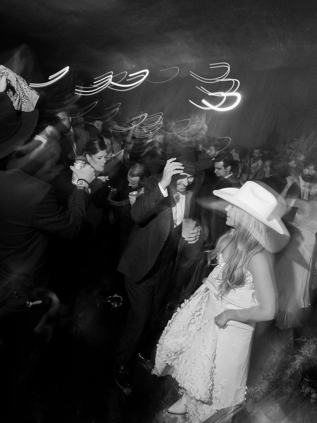 Image may contain Rick Dore Urban Adult Person Wedding Back Body Part Clothing Hat Dress Face and Head