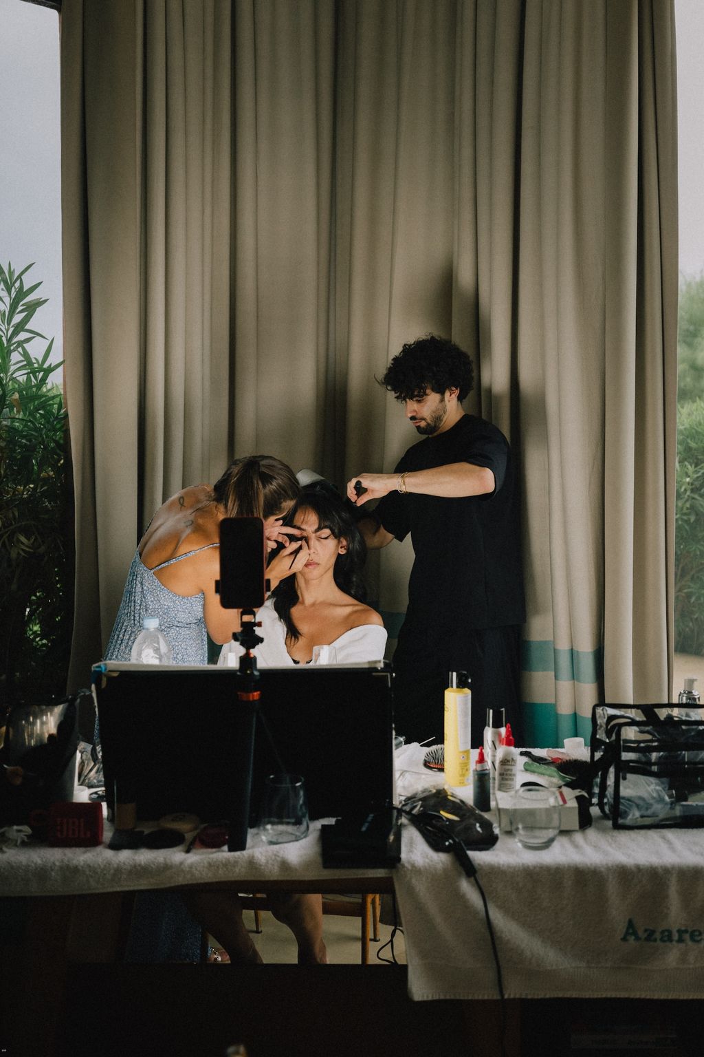 Image may contain Romain Gavras Adult Person Wedding Accessories Bag Handbag Photography Face Head and Plant