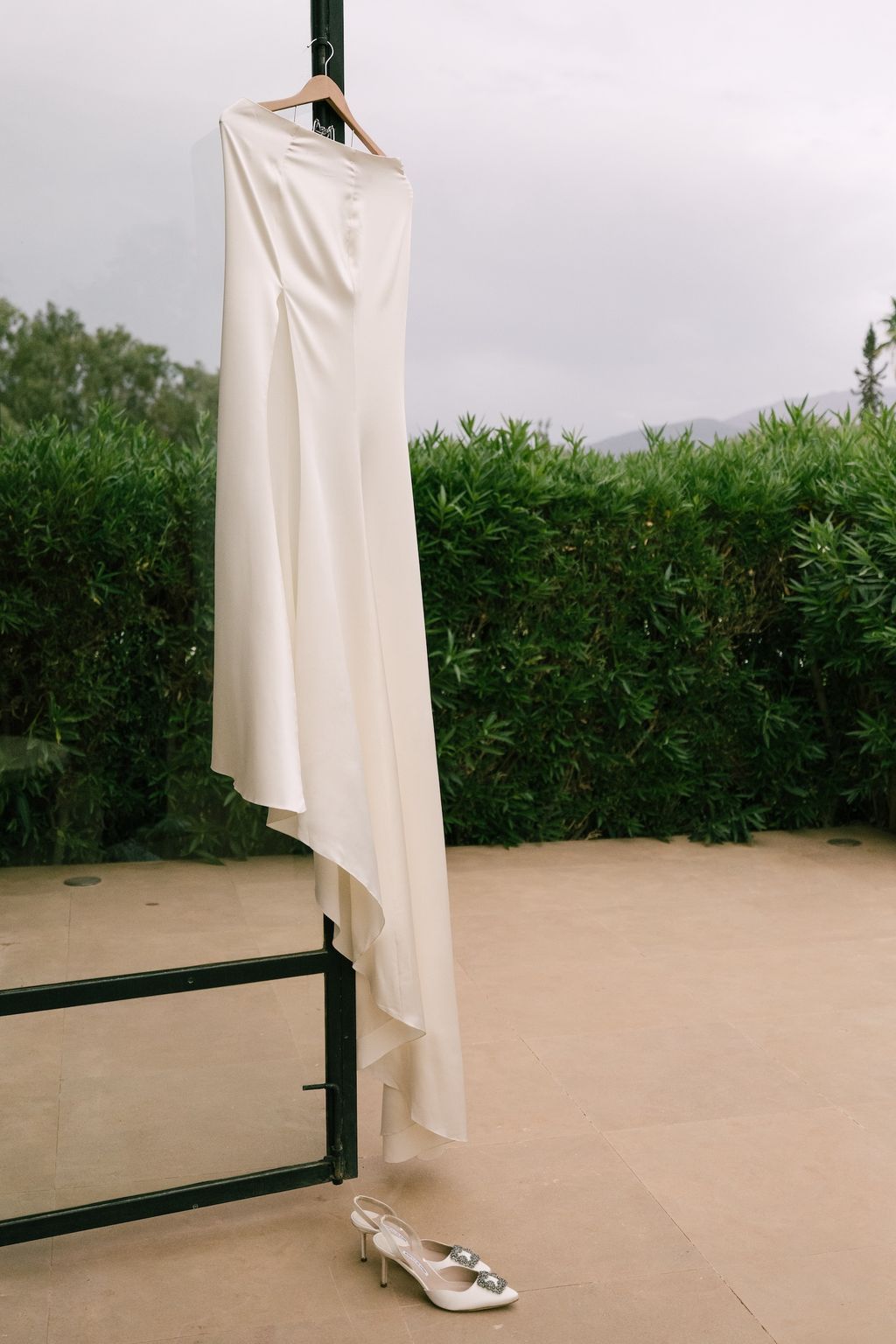 Image may contain Cape Clothing and Sleeve