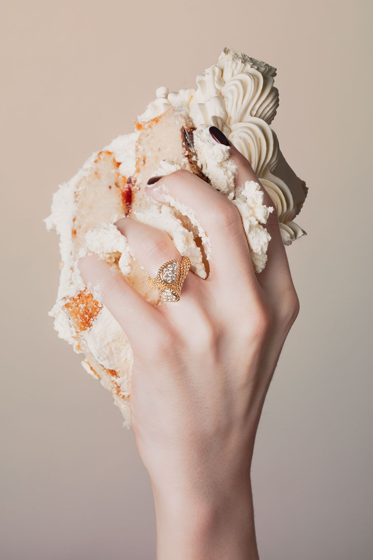Image may contain Cream Dessert Food Ice Cream Soft Serve Ice Cream Adult Person Wedding Icing and Body Part