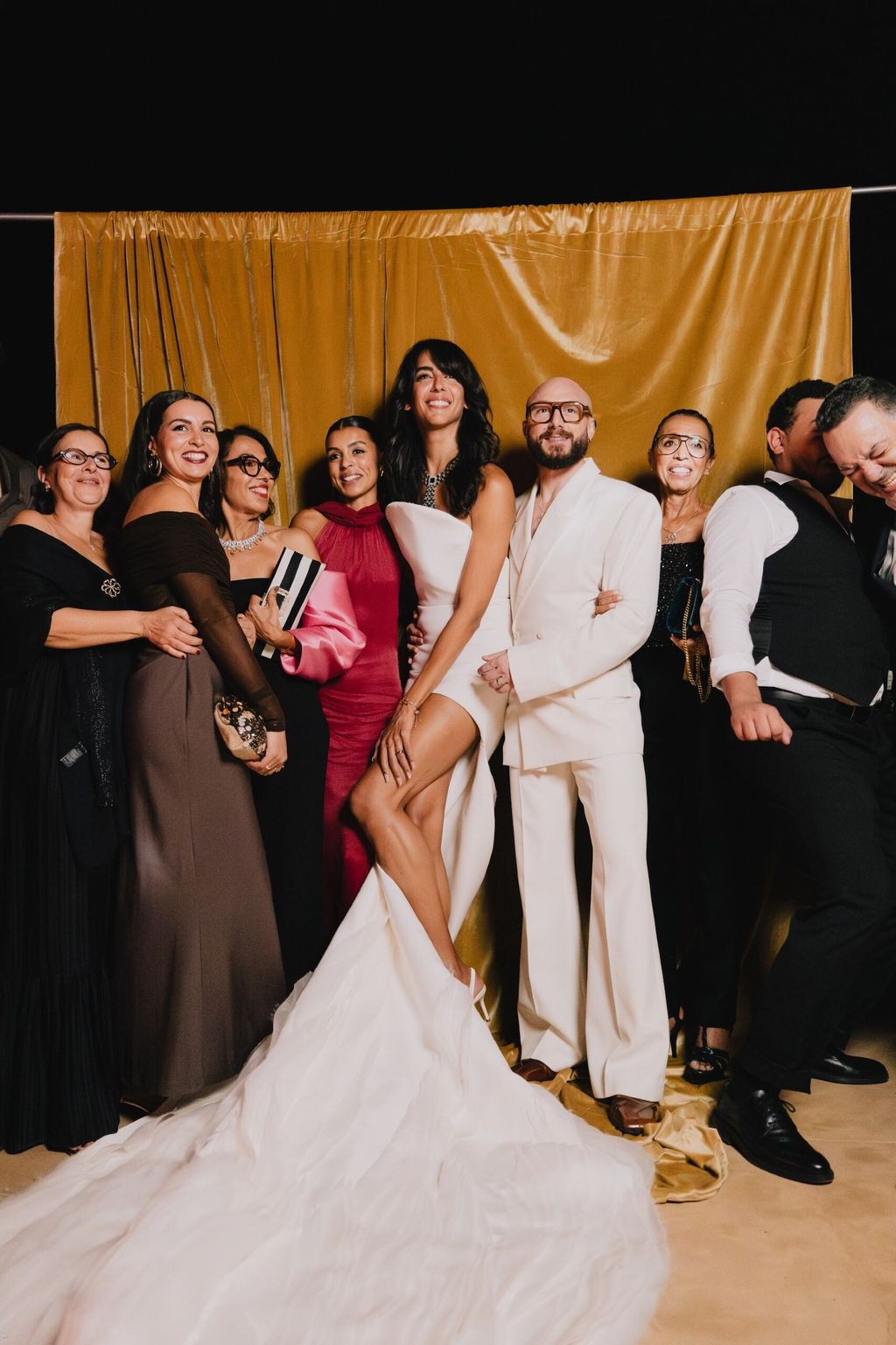 Image may contain Arlissa Adult Person Wedding Groupshot Face Head Accessories Jewelry Necklace and Clothing