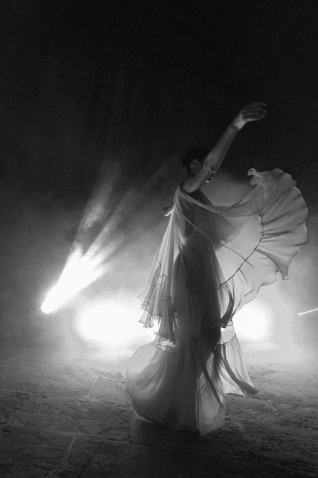 Image may contain Dancing Leisure Activities Person Adult Wedding Performer Solo Performance and Lighting