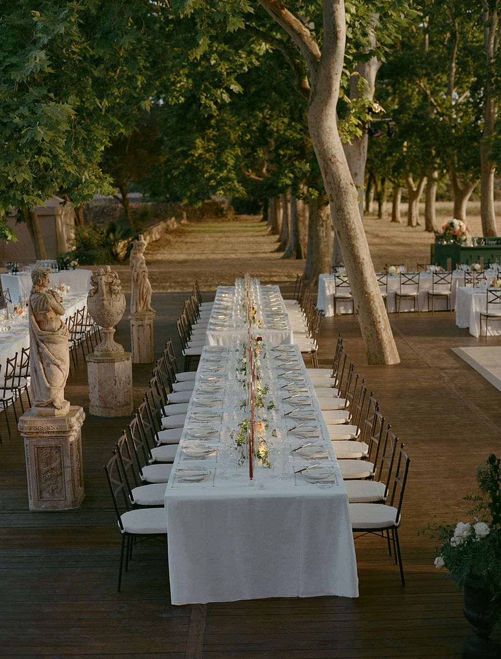 Image may contain Indoors Dining Table Furniture Table Hall Person Fun Chair Tabletop and Banquet