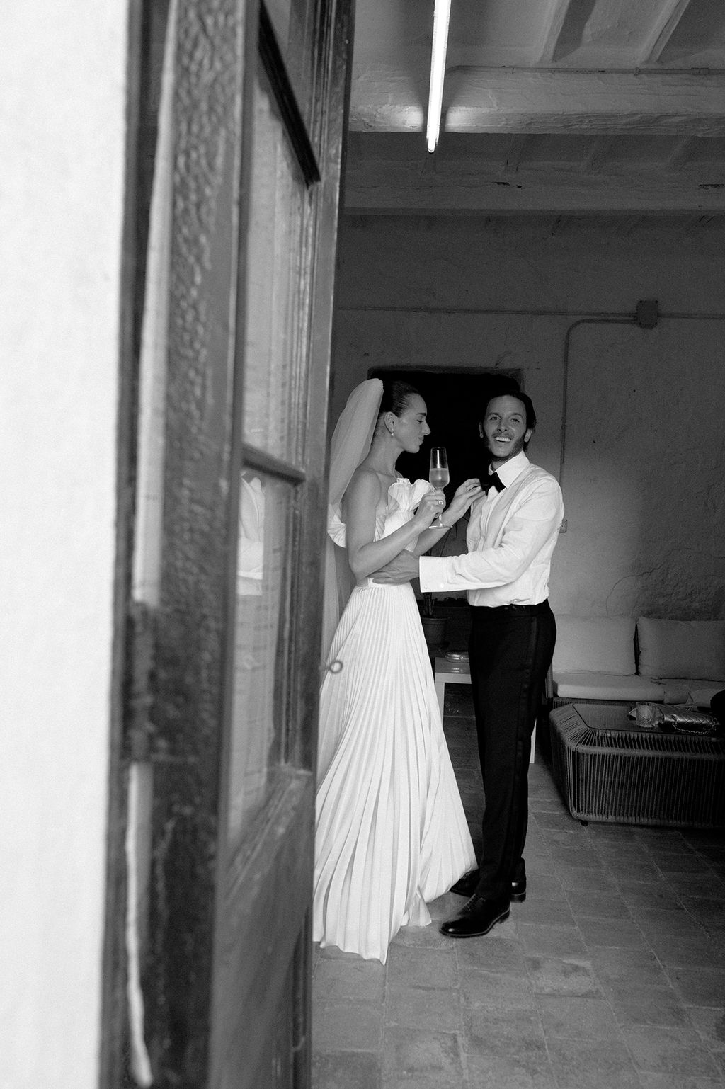 Image may contain Clothing Dress Formal Wear Fashion Gown Suit Adult Person Wedding Wedding Gown and Accessories