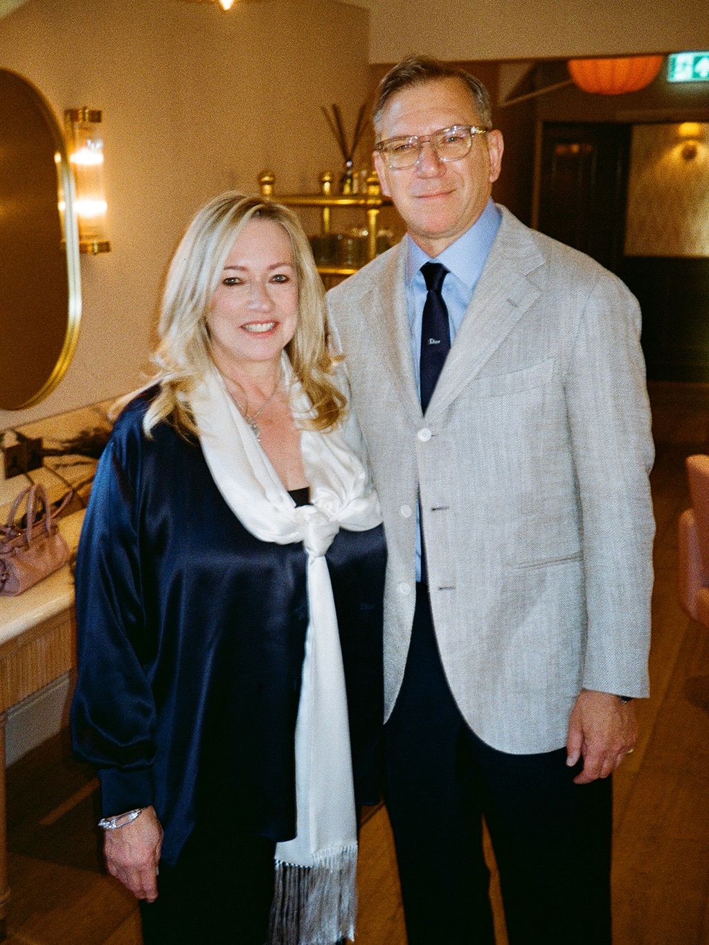Image may contain Blazer Clothing Coat Jacket Formal Wear Suit Face Head Person Photography and Portrait