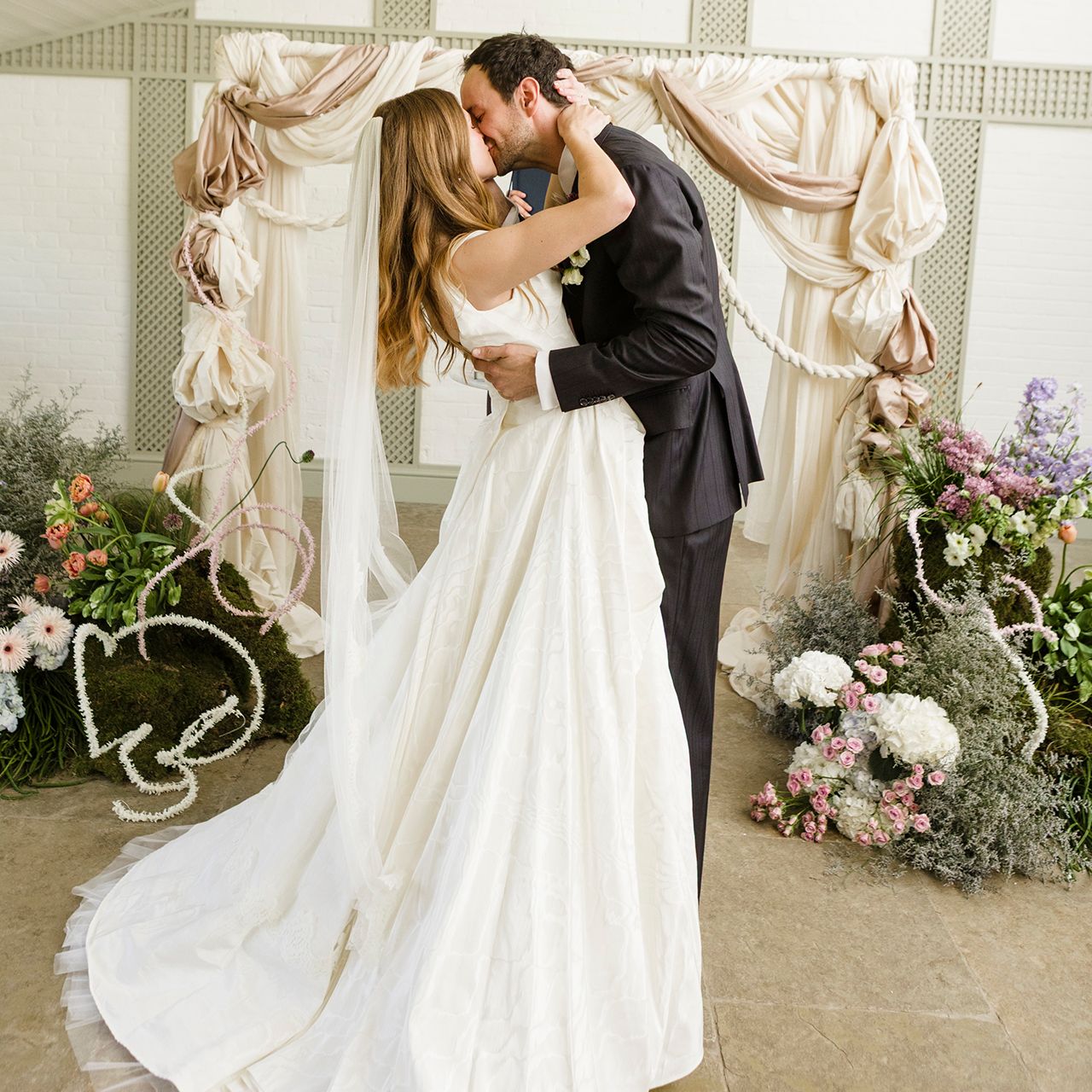 The Bride Wore A ’90s Garter With A Vivienne Westwood Dress For Her Folk-Inspired Wedding