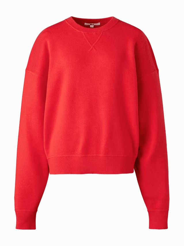 Image may contain Clothing Knitwear Sweater Sweatshirt and Hoodie