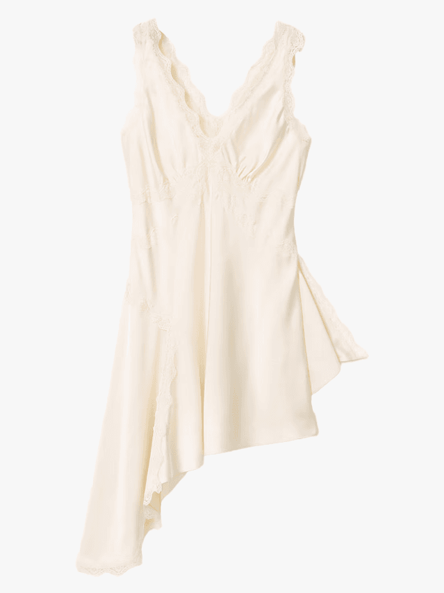 Image may contain Blouse Clothing Dress Fashion Formal Wear Gown Wedding and Wedding Gown
