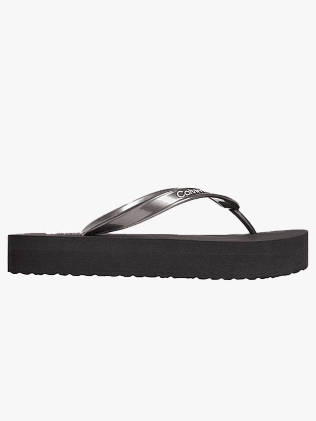 Image may contain Clothing Footwear Sandal Accessories Belt and FlipFlop